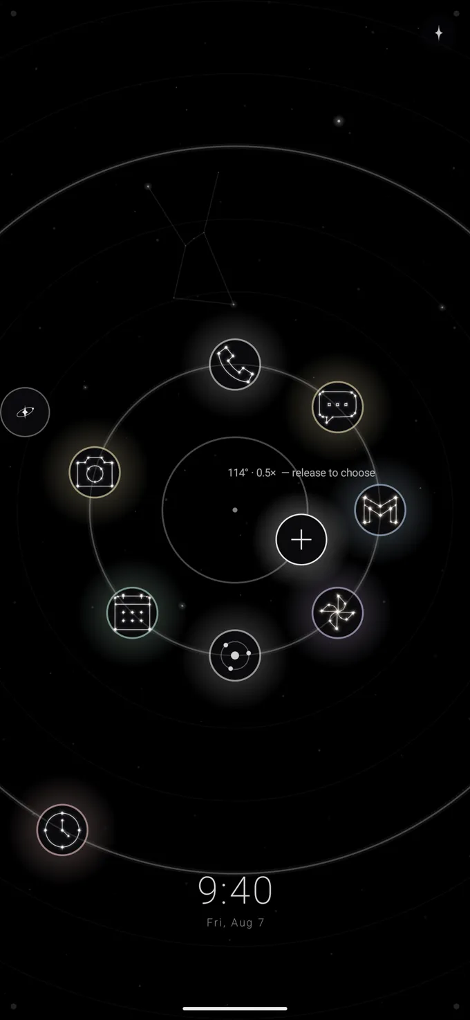 The launcher's edit mode, placing a new app-star into the ring with an on-screen prompt reading release to choose.